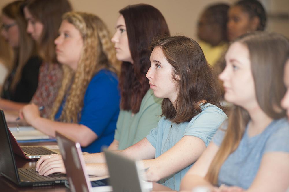 A Montevallo student listens to a presentation.